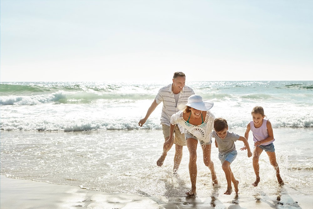 Happy Family at Beach Image of Happy Family at Beach